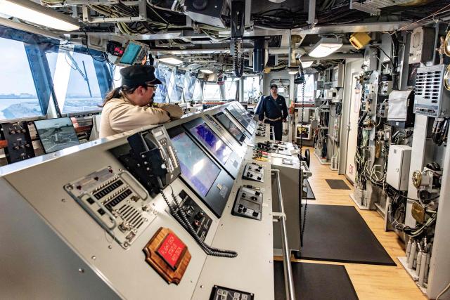 Members of crew of the US Navy command ship USS Mount Whitney speak in the control room as the ship is docked in the harbour of Zeebrugge, on July 2, 2026. (Photo by KURT DESPLENTER / Belga / AFP) / Belgium OUT