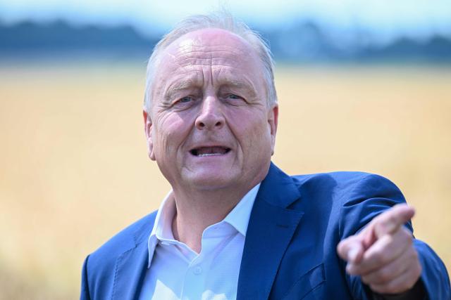 Joachim Rukwied, President of the German Farmers' Association (Deutscher Bauernverband) gestures during a press conference of the German Farmers’ Association to mark the start of the harvest in Gross Machnow, eastern Germany, on July 2, 2026. (Photo by RALF HIRSCHBERGER / AFP)