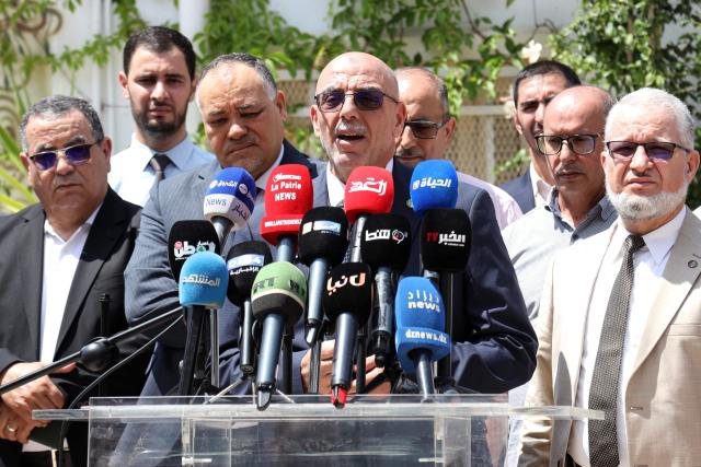 Head of Algeria's Islamist Movement of Society for Peace (MSP) Abdelaali Hassani Cherif addresses the media at a polling station during parliamentary elections in Algiers on July 2, 2026. Algerians headed to the polls on July 2 to elect a new parliament in an election shadowed by expectations of low turnout among the 25-million-person electorate. (Photo by AFP)