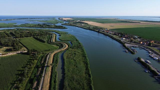 (FILES) This aerial photograph shows the Po River Delta in Scardovari, northeastern Italy, on June 25, 2026. Veneto, a region in north-eastern Italy, declared a state of emergency on July 2, 2026 due to the drought affecting it, with 28% less rainfall over the first five months of the year compared with 2025, on July 2, 2026 (Photo by Stefano RELLANDINI / AFP)