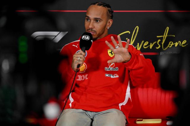 Ferrari's British driver Lewis Hamilton attends a press conference ahead of the Formula One British Grand Prix at the Silverstone motor racing circuit in Silverstone, central England, on July 2, 2026. (Photo by Andrej ISAKOVIC / AFP)