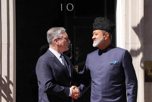 Britain's Prime Minister Keir Starmer (L) welcomes Oman's Sultan Haitham bin Tarik upon his arrival at 10 Downing Street for a meeting, in central London on July 2, 2026. (Photo by CARLOS JASSO / POOL / AFP)