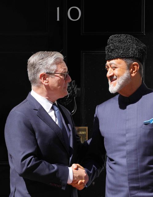 Britain's Prime Minister Keir Starmer (L) welcomes Oman's Sultan Haitham bin Tarik upon his arrival at 10 Downing Street for a meeting, in central London on July 2, 2026. (Photo by CARLOS JASSO / POOL / AFP)