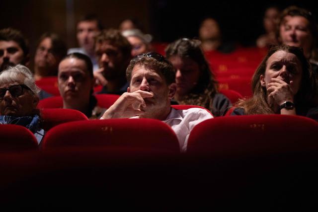 "Maxi Edmond de Rothschild" Ultim Class French sailor Charles Caudrelier (C) attends the plenary session marking the kick-off of the 13th Route du Rhum at the Hermine theater in Saint-Malo, western France on June 30, 2026. From Saint-Malo in Brittany to Pointe-à-Pitre in Guadeloupe, over 100 skippers across 6 classes will take the start on November 1, 2026, in this solo transatlantic sailing race. (Photo by Lou BENOIST / AFP)