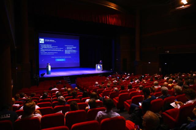 Skippers attend the plenary session marking the kick-off of the 13th Route du Rhum at the Hermine theater in Saint-Malo, western France on June 30, 2026. From Saint-Malo in Brittany to Pointe-à-Pitre in Guadeloupe, over 100 skippers across 6 classes will take the start on November 1, 2026, in this solo transatlantic sailing race. (Photo by Lou BENOIST / AFP)