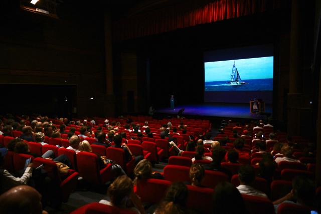 Skippers attend the plenary session marking the kick-off of the 13th Route du Rhum at the Hermine theater in Saint-Malo, western France on June 30, 2026. From Saint-Malo in Brittany to Pointe-à-Pitre in Guadeloupe, over 100 skippers across 6 classes will take the start on November 1, 2026, in this solo transatlantic sailing race. (Photo by Lou BENOIST / AFP)