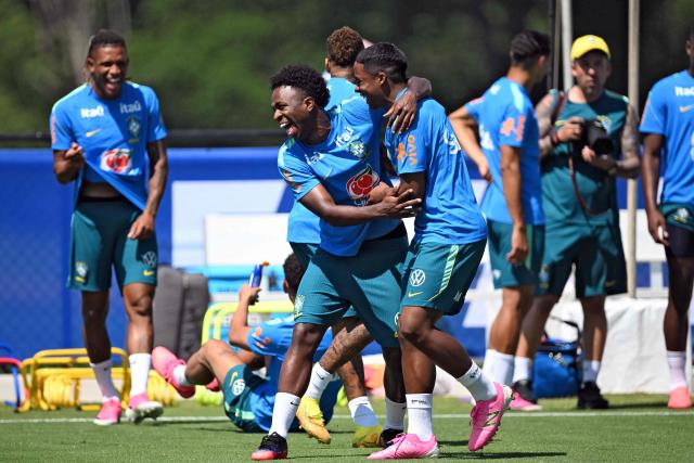 Brazil's forward #07 Vinicius Junior (C) shares a laugh with Brazil's forward #19 Endrick (C,R) during a training session at the Columbia Park Training Facility in Morristown, New Jersey on July 2, 2026, during the 2026 World Cup football tournament. (Photo by MAURO PIMENTEL / AFP)