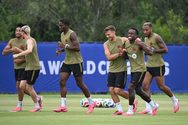 Canada's defender #22 Richie Laryea (2nd R), Canada's defender #13 Derek Cornelius (R) and  Canada's defender #23 Niko Sigur (C) take part in a training session at the Houston Sports Park in Houston on July 2, 2026, during the 2026 World Cup football tournament. (Photo by RONALDO SCHEMIDT / AFP)
