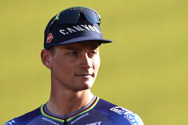 Alpecin - Premier Tech team's Dutch rider Mathieu van der Poel attends the team presentation ceremony ahead of the 113th edition of the Tour de France cycling race, with the Sagrada Familia Basilica  seen in the background, in Barcelona, northeastern Spain, on July 2, 2026. (Photo by Anne-Christine POUJOULAT / AFP)
