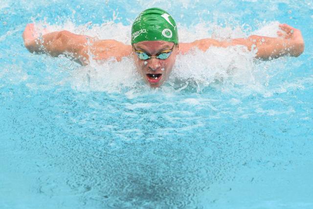(FILES) France’s Leon Marchand competes in the 400m medley final during the French national swimming championships in Saint-Etienne, central France on June 27, 2026. Having sustained an adductor injury during the French Swimming Championships, Leon Marchand has suffered a muscle injury of “moderate” severity and is expected to take “several weeks” to make a full recovery, the French national team doctor explained on July 2, 2026, with the European Championships on home soil just five weeks away. (Photo by OLIVIER CHASSIGNOLE / AFP)