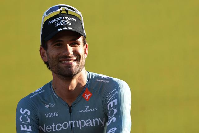 Netcompany INEOS team's Italian rider Filippo Ganna attends the team presentation ceremony ahead of the 113th edition of the Tour de France cycling race, with the Sagrada Familia Basilica  seen in the background, in Barcelona, northeastern Spain, on July 2, 2026. (Photo by Anne-Christine POUJOULAT / AFP)