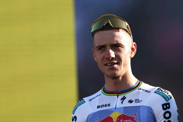 Red Bull - BORA - hansgrohe team's Belgian rider Remco Evenepoel attends the team presentation ceremony ahead of the 113th edition of the Tour de France cycling race, in Barcelona, northeastern Spain, on July 2, 2026. (Photo by Anne-Christine POUJOULAT / AFP)
