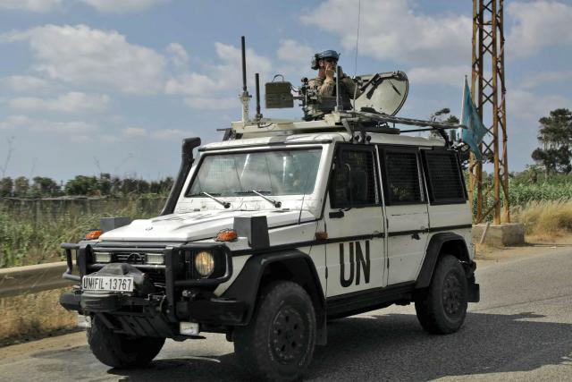 Members of United Nations Peacekeeping Force in Lebanon (UNIFIL) drive through the southern Lebanese area of Al-Mansouri on July 2, 2026. Lebanese President Joseph Aoun defended on July 2 negotiations with Israel, saying they were not a betrayal and he would not surrender "a single inch of Lebanon's territory", according to the presidency. (Photo by Kawnat HAJU / AFP)