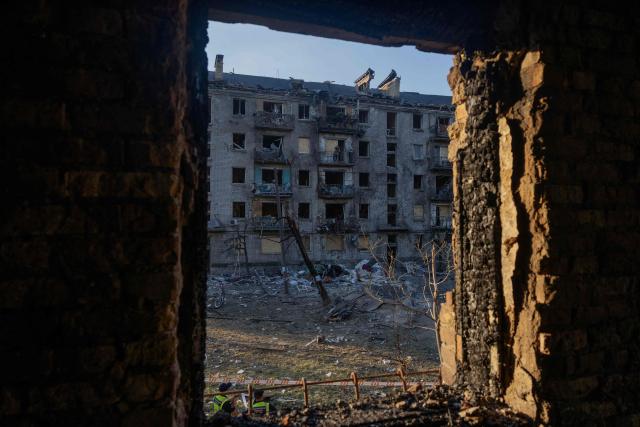 This photograph shows a residential building damaged following a Russian air attack on the Ukrainian capital of Kyiv on July 2, 2026, amid the Russian invasion in Ukraine. Russia launched its largest ever barrage on Kyiv early July 2, 2026, according to the city's mayor, tearing open apartment buildings in an hours-long drone and missile attack that killed at least 21 people. (Photo by Tetiana DZHAFAROVA / AFP)