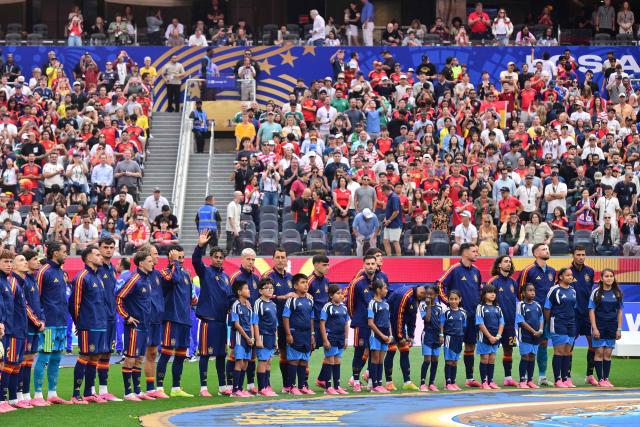 Spain's players stand for their national anthem ahead of the 2026 World Cup round of 32 football match between Spain and Austria at the Los Angeles Stadium in Inglewood on July 2, 2026.  (Photo by Frederic J. Brown / AFP)