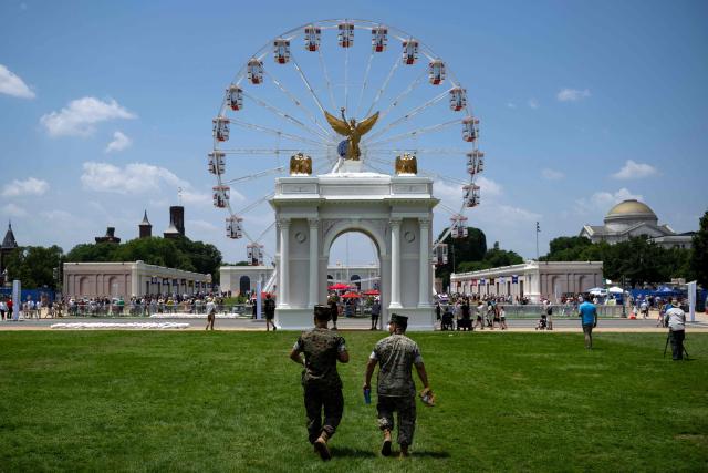 President Trump’s planned “Triumphal Arch” is seen as people visit the Great American State Fair on the National Mall in Washington, DC, on July 2, 2026, ahead of the upcoming July 4 holiday. (Photo by Kent Nishimura / AFP)