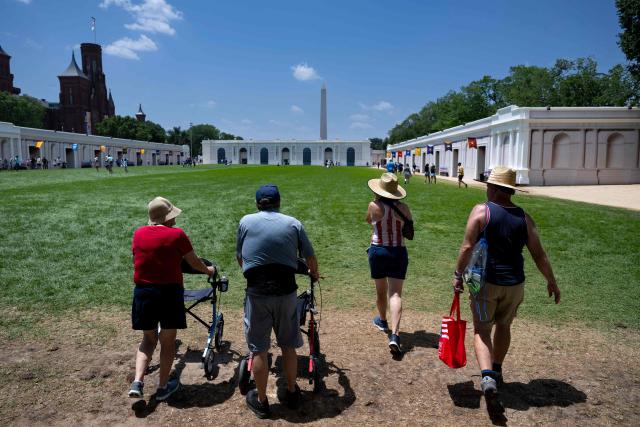 People visit the Great American State Fair on the National Mall in Washington, DC, on July 2, 2026, ahead of the upcoming July 4 holiday. (Photo by Kent Nishimura / AFP)