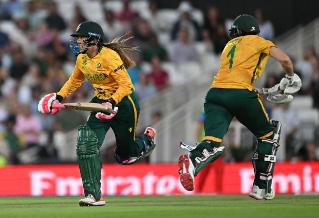 South Africa's Suné Luus (L) and South Africa's Tazmin Brits add runs during the ICC Women's Twenty20 (T20) cricket world cup 2026 semi-final game between England and South Africa, at The Oval in London on July 2, 2026. (Photo by JUSTIN TALLIS / AFP)