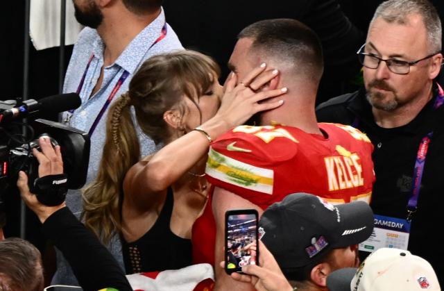 (FILES) US singer-songwriter Taylor Swift kisses Kansas City Chiefs' tight end #87 Travis Kelce after the Chiefs won Super Bowl LVIII against the San Francisco 49ers at Allegiant Stadium in Las Vegas, Nevada, February 11, 2024. Increasing signs point to a mega-bash for the A-list celebrity couple Taylor Swift and Travis Kelce at Madison Square Garden kicking off on July 2, 2026 with a rehearsal dinner. Rumors have run rampant for weeks that the 36-year-old pop superstar and the three-time NFL Super Bowl winner, both 36, could wed at the storied sports arena, home to the New York Knicks, the newly crowned NBA champions. (Photo by Patrick T. Fallon / AFP)