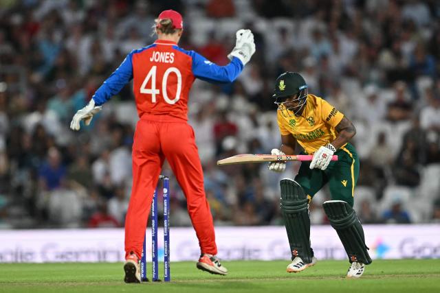 South Africa's Sinalo Jafta looks at the stumps as she is run out for one run during the ICC Women's Twenty20 (T20) cricket world cup 2026 semi-final game between England and South Africa, at The Oval in London on July 2, 2026. (Photo by JUSTIN TALLIS / AFP)