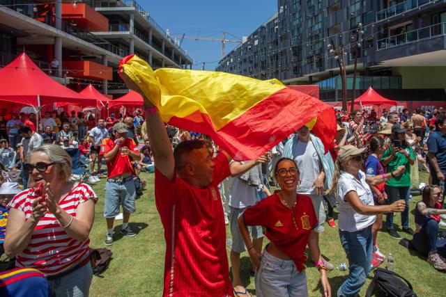 Spain fans celebrate their team's victory as they watch the 2026 FIFA World Cup Round of 32 football match between Spain and Austria at the Casa Espana fan zone hosted by the Royal Spanish Football Federation (RFEF), at Ivy Station in Culver City, California, on July 2, 2026. (Photo by Apu GOMES / AFP)