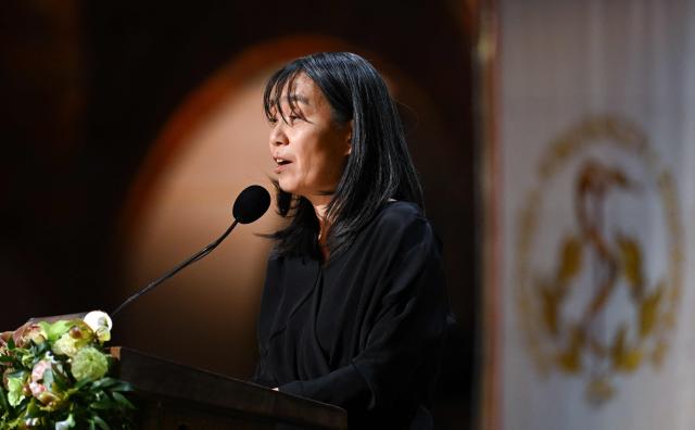 (FILES) Nobel Prize in Literature 2024 laureate, South Korean writer Han Kang delivers a speech during the Nobel Prize banquet at the City Hall in Stockholm, Sweden on December 10, 2024. After English, Spanish, and Arabic, the Avignon Festival has chosen Korean as its guest language for its 80th edition, which begins on July 4, 2026, notably through the presence of artists from the peninsula and of the 2024 Nobel Prize in Literature laureate Han Kang. (Photo by Jonathan NACKSTRAND / AFP)