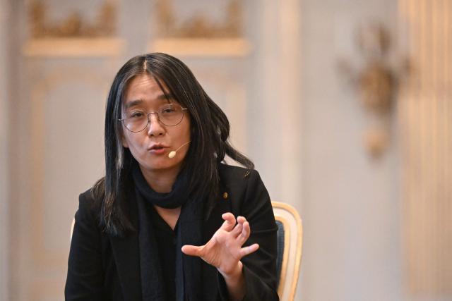 (FILES) Nobel Prize in Literature 2024 laureate and South Korean writer Han Kang addresses a press conference at the Swedish Academy in Stockholm, Sweden on December 6, 2024. After English, Spanish, and Arabic, the Avignon Festival has chosen Korean as its guest language for its 80th edition, which begins on July 4, 2026, notably through the presence of artists from the peninsula and of the 2024 Nobel Prize in Literature laureate Han Kang. (Photo by Jonathan NACKSTRAND / AFP)