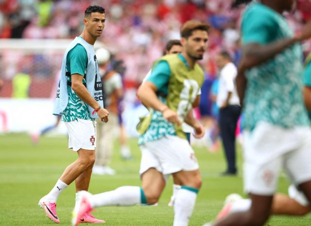 Portugal's forward #07 Cristiano Ronaldo warms up ahead of the 2026 World Cup round of 32 football match between Portugal and Croatia at the Toronto Stadium in Toronto on July 2, 2026.  (Photo by Cole Burston / AFP)