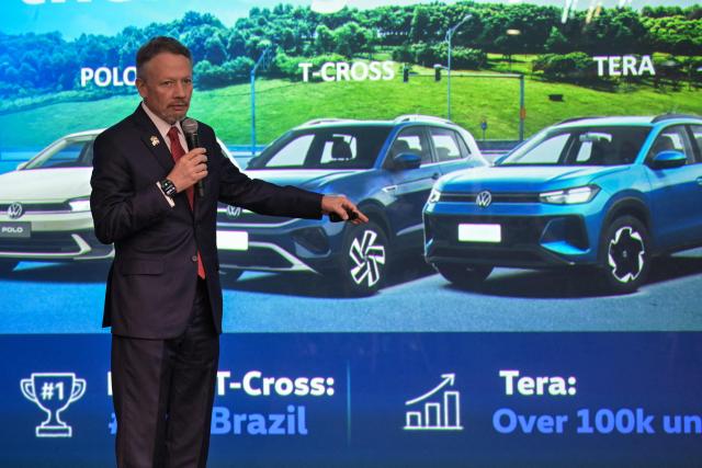 Volkswagen Chief Executive Officer Ciro Possobom speaks during a visit by German Foreign Minister Johann Wadephul to the Volkswagen plant in Sao Bernardo do Campo, Sao Paulo state, Brazil, on July 2, 2026. (Photo by Nelson ALMEIDA / AFP)