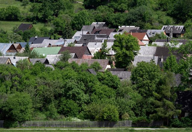 A general view shows the UNESCO-listed Slovak village of Vlkolinec, near the Central Slovakian town of Ruzomberok on June 6, 2026. The village Vlkolinec was recognized by UNESCO in 1993 and with 45 original houses is one of the three preserved groups of wooden houses in Central Europe on the World Heritage list, along with two other sites located in Hungary and the Czech Republic. (Photo by Joe KLAMAR / AFP)