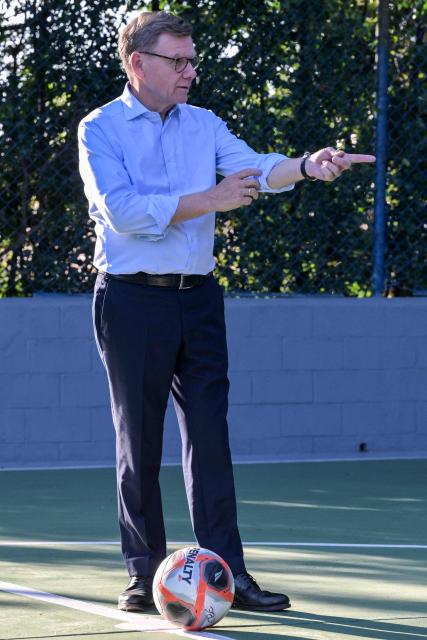 German Foreign Minister Johann Wadephul plays football during a visit to the Volkswagen plant in Sao Bernardo do Campo, Sao Paulo state, Brazil, on July 2, 2026. (Photo by Nelson ALMEIDA / AFP)