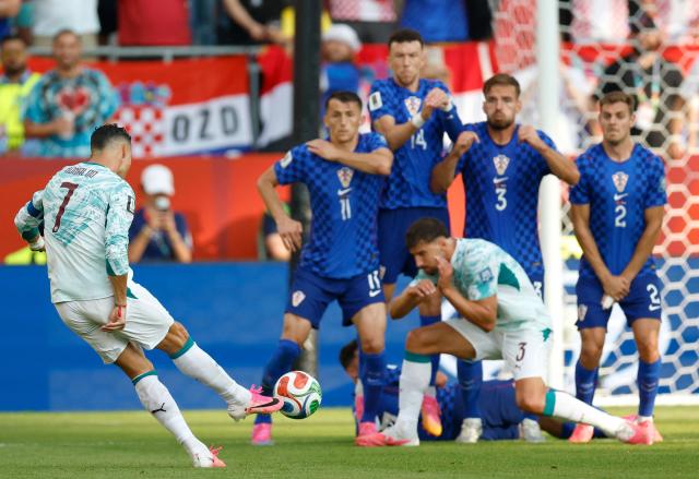 Portugal's forward #07 Cristiano Ronaldo takes a free kick during the 2026 World Cup round of 32 football match between Portugal and Croatia at the Toronto Stadium in Toronto on July 2, 2026.  (Photo by Cole Burston / AFP)