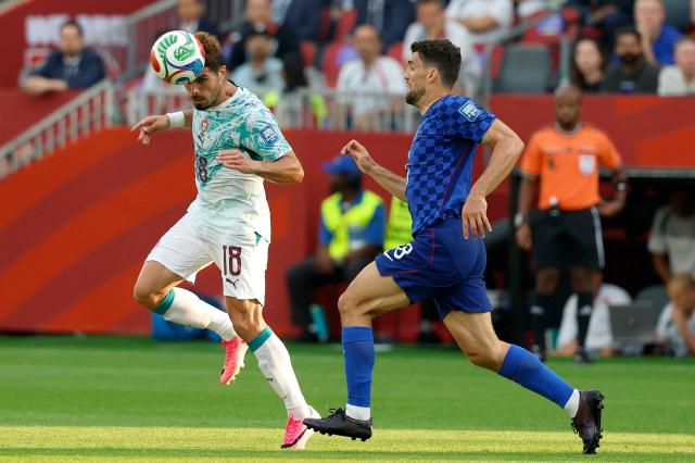 Portugal's forward #18 Pedro Neto and Croatia's midfielder #08 Mateo Kovacic fight for the ball during the 2026 World Cup round of 32 football match between Portugal and Croatia at the Toronto Stadium in Toronto on July 2, 2026.  (Photo by Kamil Krzaczynski / AFP)