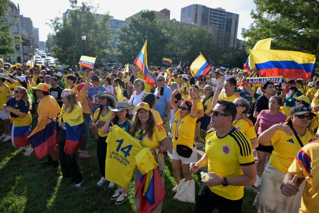 Colombian fans take part in a "banderazo" flag-waving gathering at Mill Creek Park in Kansas City on July 2, 2026, on the eve of the 2026 World Cup round of 32 football match between Colombia and Ghana. (Photo by JUAN MABROMATA / AFP)