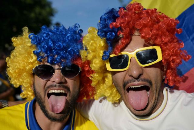 Colombian fans take part in a "banderazo" flag-waving gathering at Mill Creek Park in Kansas City on July 2, 2026, on the eve of the 2026 World Cup round of 32 football match between Colombia and Ghana. (Photo by JUAN MABROMATA / AFP)