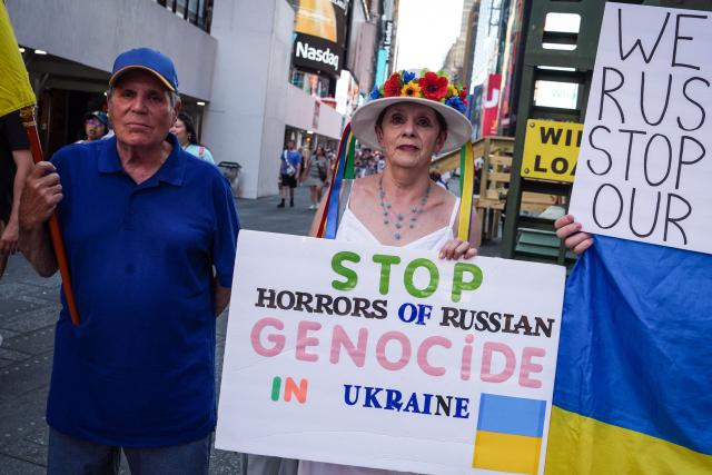 Demonstrators march in support of Ukraine in Times Square, New York on July 2, 2026. Ukraine and Russia on July 2, 2026 vowed fresh assaults in their over-four-year war after Moscow launched a massive barrage on Kyiv, killing at least 27 people, tearing open apartment buildings and sending tens of thousands to shelters. (Photo by Ryan MURPHY / AFP)