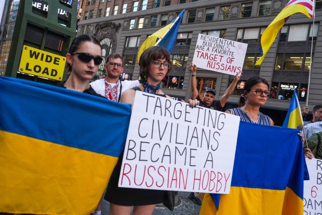 Demonstrators march in support of Ukraine in Times Square, New York on July 2, 2026. Ukraine and Russia on July 2, 2026 vowed fresh assaults in their over-four-year war after Moscow launched a massive barrage on Kyiv, killing at least 27 people, tearing open apartment buildings and sending tens of thousands to shelters. (Photo by Ryan MURPHY / AFP)