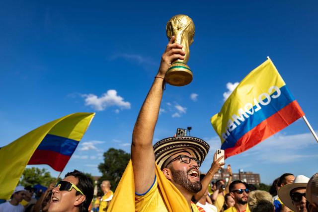 Colombian fans take part in a "banderazo" flag-waving gathering at Mill Creek Park in Kansas City on July 2, 2026, on the eve of the 2026 World Cup round of 32 football match between Colombia and Ghana. (Photo by Odd Andersen / AFP)