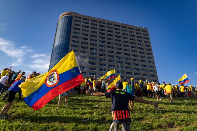 Colombian fans take part in a "banderazo" flag-waving gathering at Mill Creek Park in Kansas City on July 2, 2026, on the eve of the 2026 World Cup round of 32 football match between Colombia and Ghana. (Photo by Odd Andersen / AFP)
