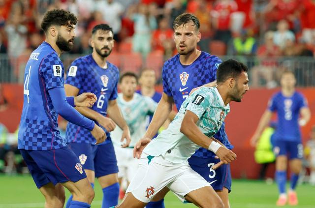 Portugal's forward #09 Goncalo Ramos (R) celebrates after scoring his team's second goal during the 2026 World Cup round of 32 football match between Portugal and Croatia at the Toronto Stadium in Toronto on July 2, 2026.  (Photo by Kamil Krzaczynski / AFP)