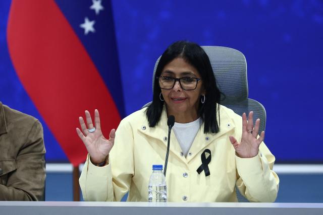 Venezuela's interim President Delcy Rodriguez speaks during a press conference at the Generalisimo Francisco de Miranda Air Base in Caracas on July 2, 2026. At least 2,595 people have died as a result of the twin earthquakes that struck Venezuela on June 24, interim President Delcy Rodriguez announced on July 2, adding that all of the victims will be properly identified. (Photo by Lucas AGUAYO / AFP)
