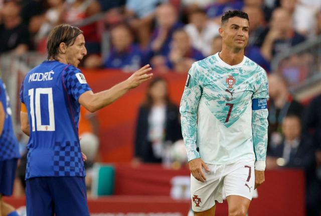 Portugal's forward #07 Cristiano Ronaldo and Croatia's midfielder #10 Luka Modric react during the 2026 World Cup round of 32 football match between Portugal and Croatia at the Toronto Stadium in Toronto on July 2, 2026.  (Photo by Kamil Krzaczynski / AFP)