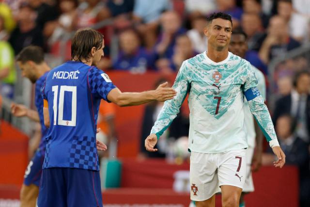Portugal's forward #07 Cristiano Ronaldo and Croatia's midfielder #10 Luka Modric react during the 2026 World Cup round of 32 football match between Portugal and Croatia at the Toronto Stadium in Toronto on July 2, 2026.  (Photo by Kamil Krzaczynski / AFP)