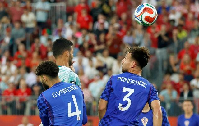 Portugal's forward #09 Goncalo Ramos (2nd L) heads the ball to score his team's second goal during the 2026 World Cup round of 32 football match between Portugal and Croatia at the Toronto Stadium in Toronto on July 2, 2026.  (Photo by Kamil Krzaczynski / AFP)