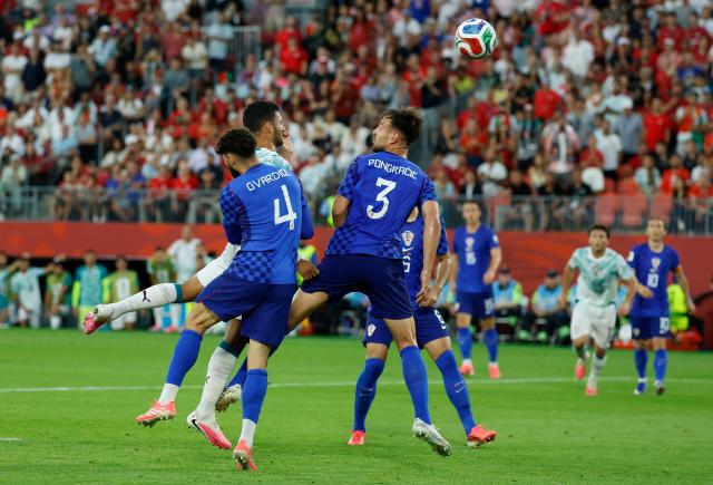 Portugal's forward #09 Goncalo Ramos (2nd L) heads the ball to score his team's second goal during the 2026 World Cup round of 32 football match between Portugal and Croatia at the Toronto Stadium in Toronto on July 2, 2026.  (Photo by Kamil Krzaczynski / AFP)