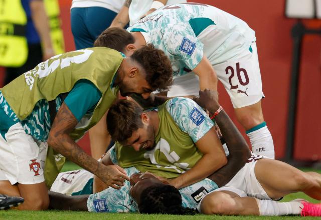 Portugal players celebrate their team's second goal during the 2026 World Cup round of 32 football match between Portugal and Croatia at the Toronto Stadium in Toronto on July 2, 2026.  (Photo by Kamil Krzaczynski / AFP)