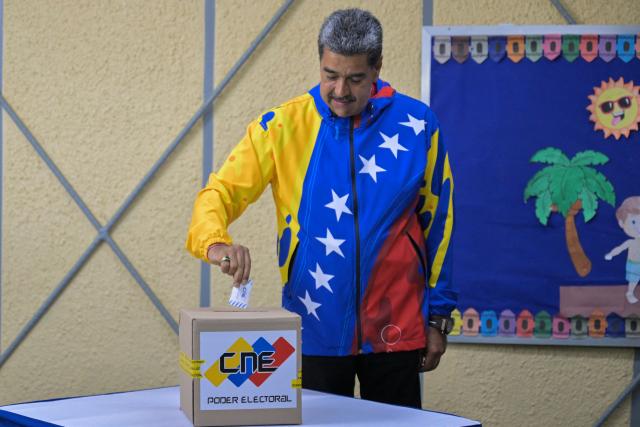(FILES) Venezuelan President and presidential candidate Nicolas Maduro casts his vote during the presidential election, in Caracas on July 28, 2024. July 3, 2026 marks six months since the capture of Nicolas Maduro during a US military operation in Venezuela. (Photo by Juan BARRETO / AFP)