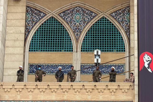 Members of Iranian security personnel stand guard at the Grand Mosalla in Tehran on July 3, 2026, ahead of Iran's slain supreme leader Ali Khamenei's funeral. Preparations for the funeral of Khamenei were in full swing on July 3, with authorities expecting millions and a coterie of foreign dignitaries to attend the official ceremony. (Photo by Atta KENARE / AFP) / 