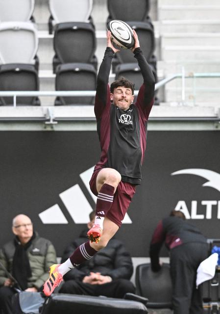 New Zealand's Leroy Carter catches the ball during a captain's run training session at One New Zealand Stadium in Christchurch on July 3, 2026, ahead of the rugby Nations Championship match against France. (Photo by Sanka Vidanagama / AFP)