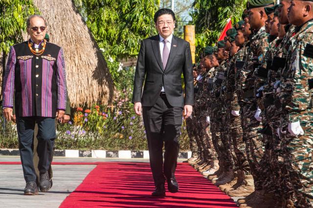 Singaporean Prime Minister Lawrence Wong (R) and East Timor's President Jose Ramos-Horta (L) inspect a guard of honour at the Nicolau Lobato Presidential Palace in Dili on July 3, 2026. (Photo by Valentino Dariell DE SOUSA / AFP)